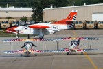 The T-2 Buckeye rolls out as Iron Eagles (Super Christen Eagle I) prepare to head out for their act.